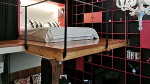 A bedroom with a bunk bed, a wooden desk, a chandelier, and a bookshelf. - Lian's Cozy Cottage next to ShaanXi S. Rd Subway STA nestled in Mid. Huaihai Rd. (Shanghai)