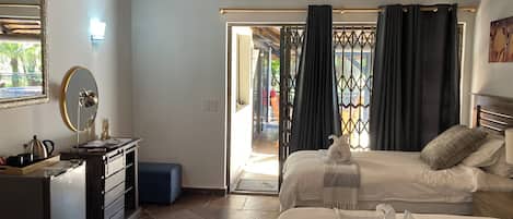 Deluxe Double or Twin Room, Private Bathroom, Pool View | In-room safe, desk, laptop workspace