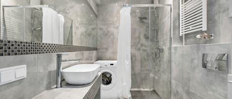 Shower, hair dryer, towels, soap