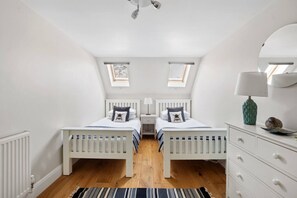 2 bedrooms, desk, iron/ironing board, travel crib