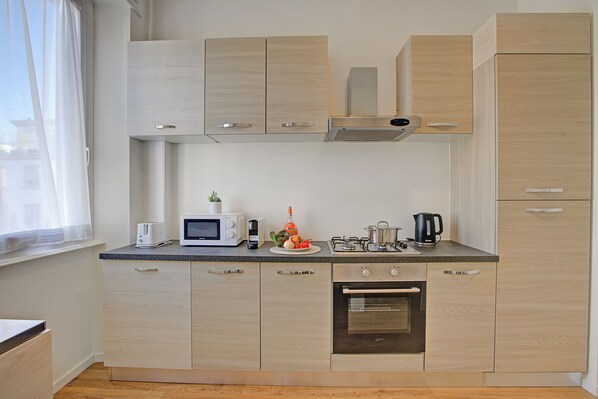 Standard-Apartment, 1 Schlafzimmer (Dream of Lugano Downtown) | Eigene Küche | Kühlschrank, Mikrowelle, Ofen, Herdplatte