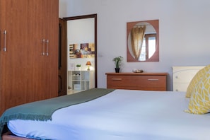 Departamento | 1 habitación, tabla de planchar con plancha, wifi gratis y ropa de cama 