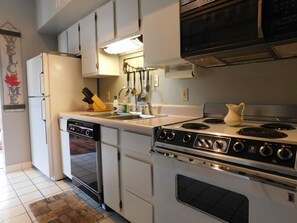 Fridge, microwave, stovetop, coffee/tea maker - Laurel Inn 606 is a spacious 2BR condo with private balcony close to downtown (Gatlinburg)