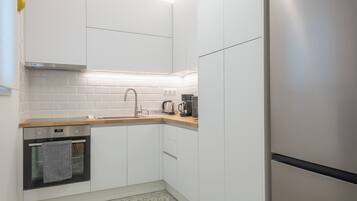 Comfort Apartment, City View | Private kitchen | Espresso maker, coffee/tea maker, electric kettle