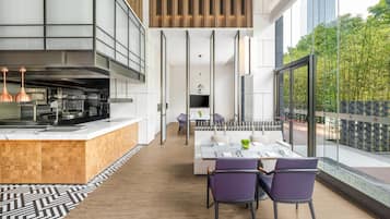 Espresso maker, electric kettle, dining tables