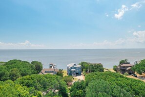 Exterior - Soundfront Duck home w/ stunning sunset views, pool, hot tub, rec room & linens! (Duck)