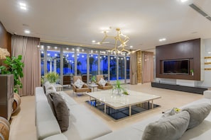 Panoramic Villa, 6 Bedrooms, Beach View | Living area | 43-inch Smart TV with digital channels