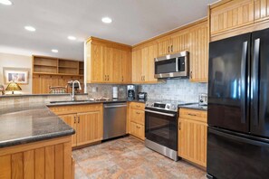 Fridge, microwave, oven, stovetop - The Charter at Beaver Creek F4405 (Beaver Creek)