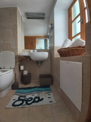 Hair dryer, towels, soap, shampoo
