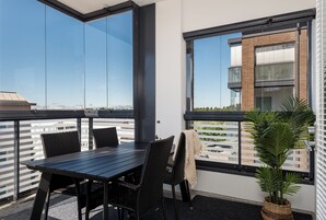 Premium Apartment, River View | Terrace/patio