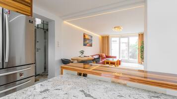 Deluxe Apartment, Sea View | Private kitchen | Electric kettle