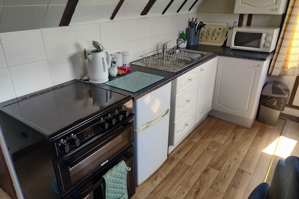 Duplex, 2 Bedrooms | Private kitchen | Mini-fridge, microwave, oven, stovetop
