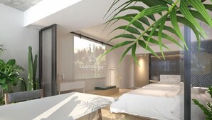 Ein modernes Schlafzimmer mit einem Bett, einem Schreibtisch und einem großen Fenster.