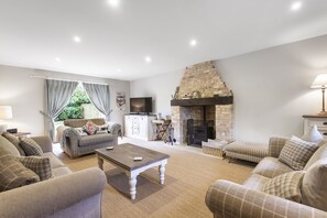 Smart TV, fireplace, DVD player, books