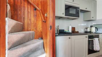 Fridge, microwave, oven, cookware/dishes/utensils