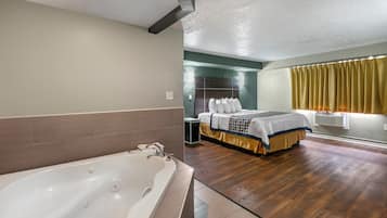 Deluxe Room, 1 King Bed, Smoking, Jetted Tub | Soundproofing, free WiFi, bed sheets
