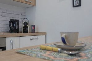 Apartment | Private kitchen | Espresso maker, electric kettle, highchair - Tana del Bianconiglio by Wonderful Italy (Turin)