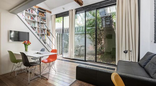 Architect's duplex loft in the heart of the Marais with outdoor patio 