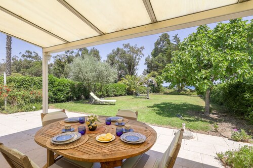 Palmeria - Maison climatisée, accès direct plage