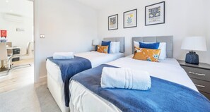 Apartamento Confort, 1 habitación, baño privado | 1 dormitorio, tabla de planchar con plancha, wifi gratis y ropa de cama