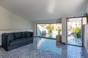 Apartment, City View | Living area | 30-inch flat-screen TV with digital channels - Porta di Castro Design Apartment with Terrace by Wonderful Italy (Palermo)
