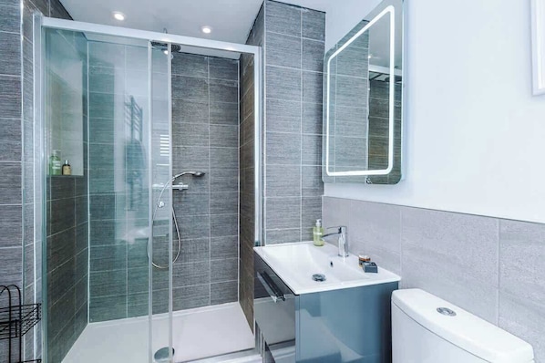 Shower, hair dryer, shampoo