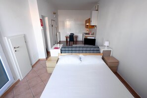 Apartment | Living area | 35-inch flat-screen TV with digital channels