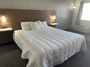 Quarto solteiro, 1 cama King | Wi-Fi de cortesia, roupa de cama