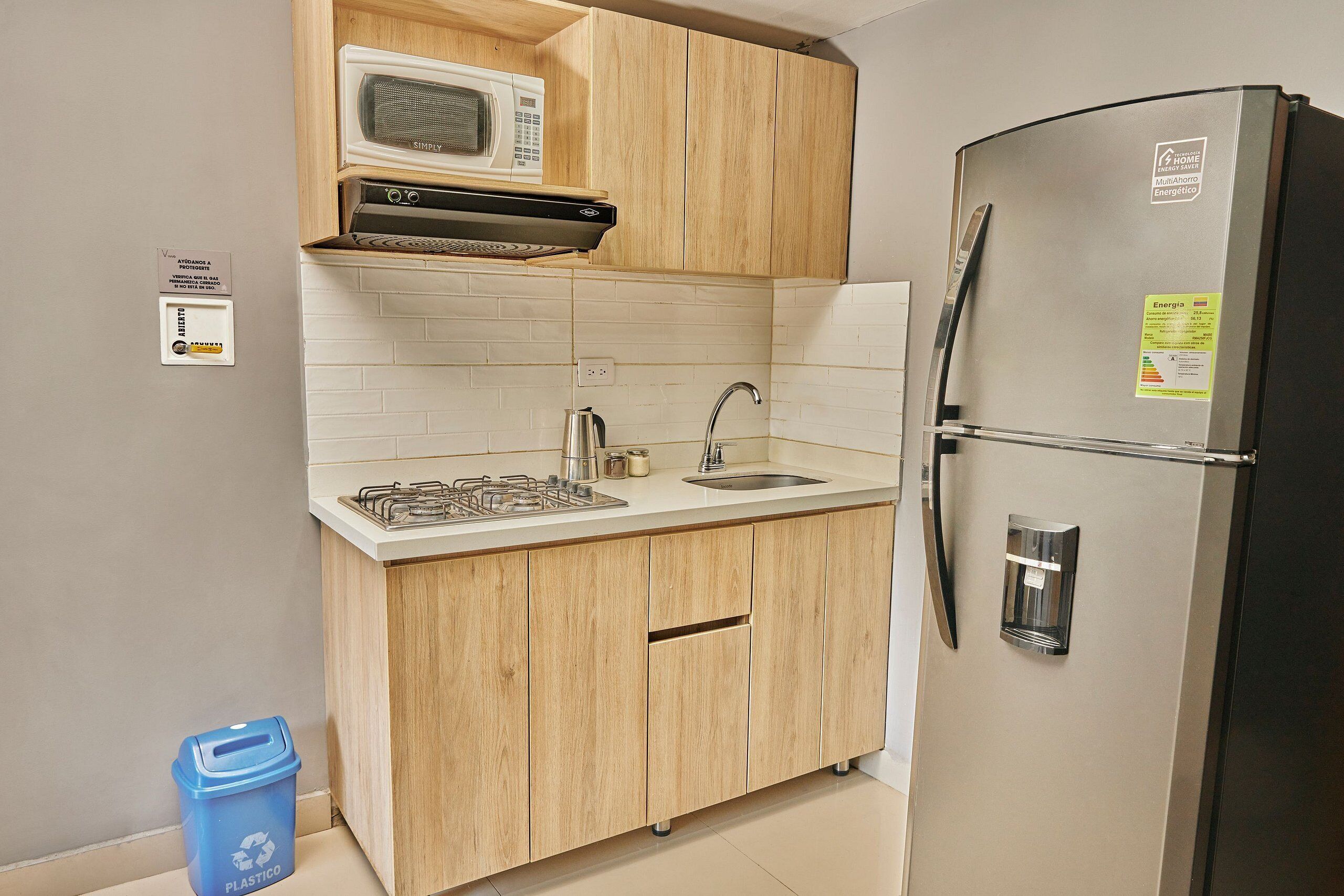 Fridge, microwave, cookware/dishes/utensils