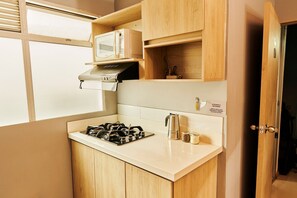 Fridge, microwave, cookware/dishes/utensils