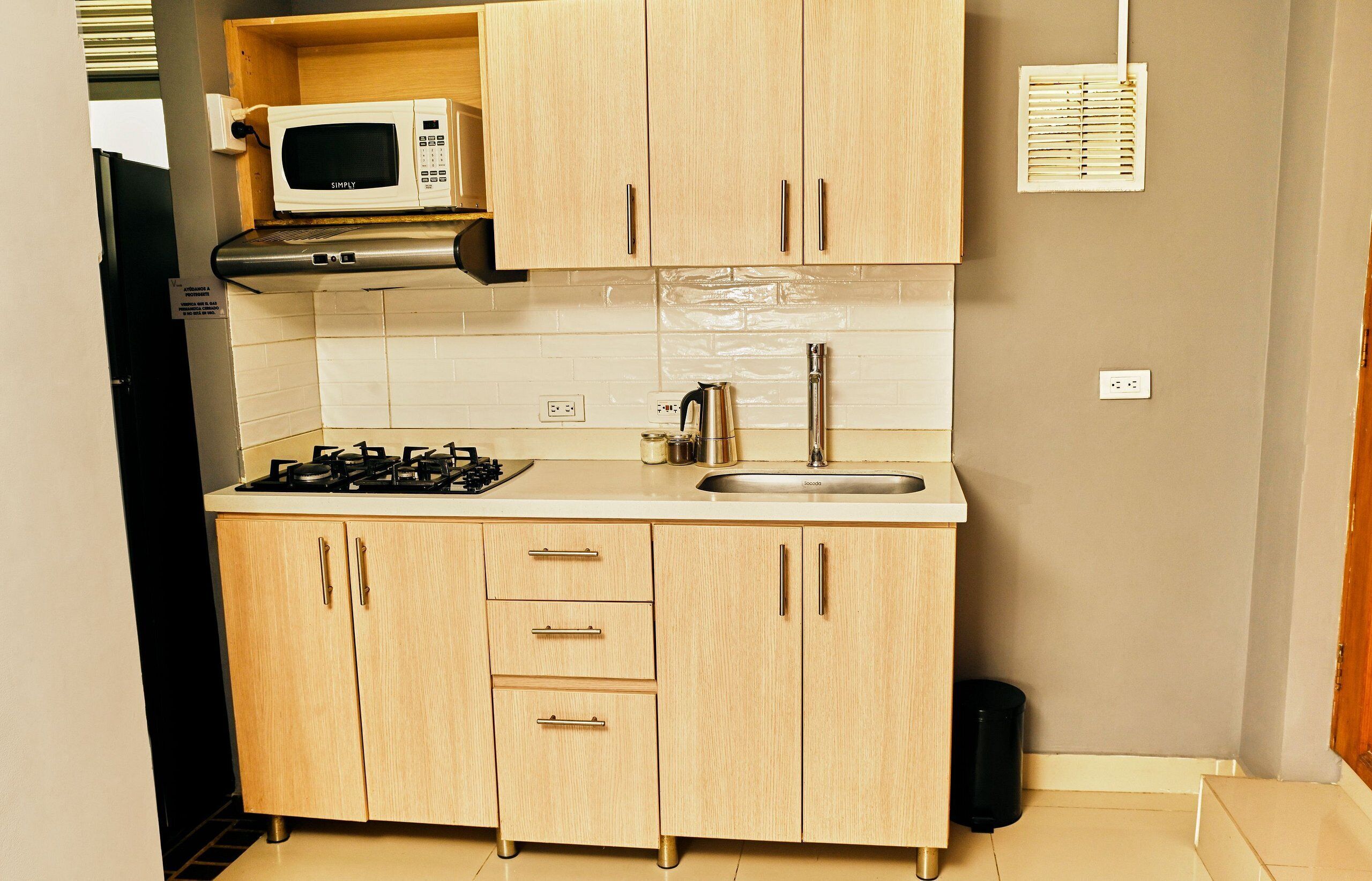 Fridge, microwave, cookware/dishes/utensils