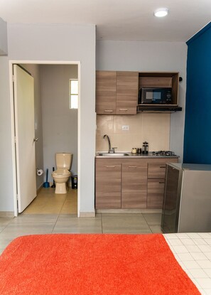 Fridge, microwave, cookware/dishes/utensils