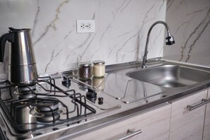 Fridge, microwave, cookware/dishes/utensils