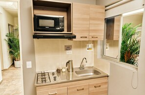 Fridge, microwave, cookware/dishes/utensils