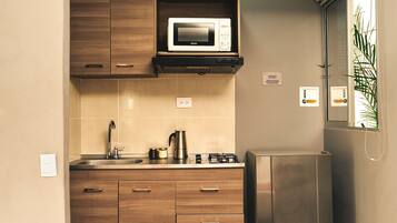 Fridge, microwave, cookware/dishes/utensils