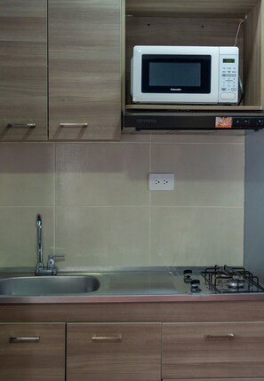 Fridge, microwave, cookware/dishes/utensils