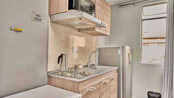 Fridge, microwave, cookware/dishes/utensils