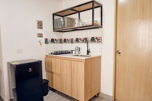 Fridge, microwave, cookware/dishes/utensils, dining tables - C203: Economic and Functional Loft (Medellín)