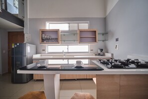 Fridge, microwave, oven, cookware/dishes/utensils