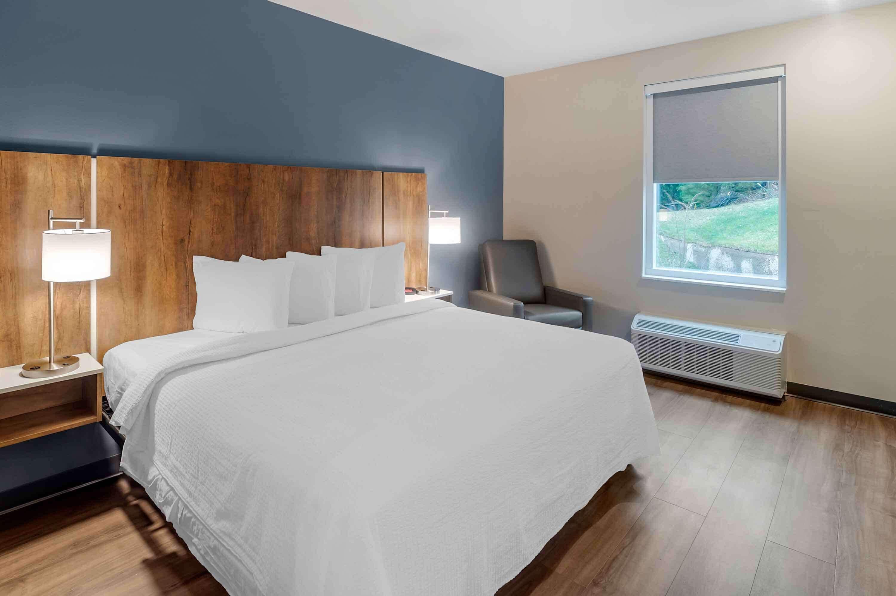 Premium bedding, laptop workspace, iron/ironing board, free WiFi