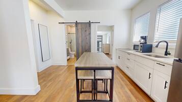 Fridge, microwave, oven, cookware/dishes/utensils