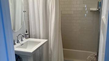 Hair dryer, towels, soap, shampoo