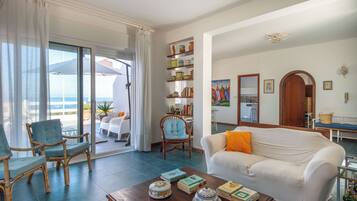 House, Garden View | Living area | 35-inch TV with digital channels