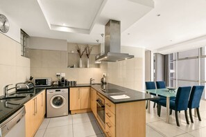 Fridge, microwave, oven, stovetop - Hydro Apartments in Sandton - 2 bedroom (Sandton)