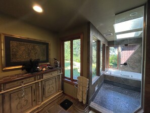 Jetted tub, hair dryer, towels, soap