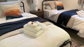 2 bedrooms, travel crib, WiFi, bed sheets