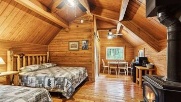 1 bedroom, desk, iron/ironing board, travel crib