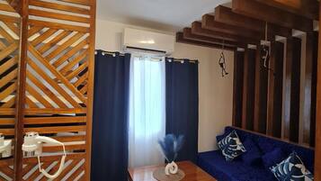 Quarto luxo | Área de estar