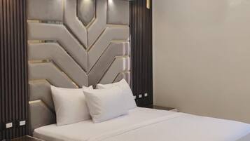 1 chambre, coffres-forts dans les chambres, fer et planche à repasser