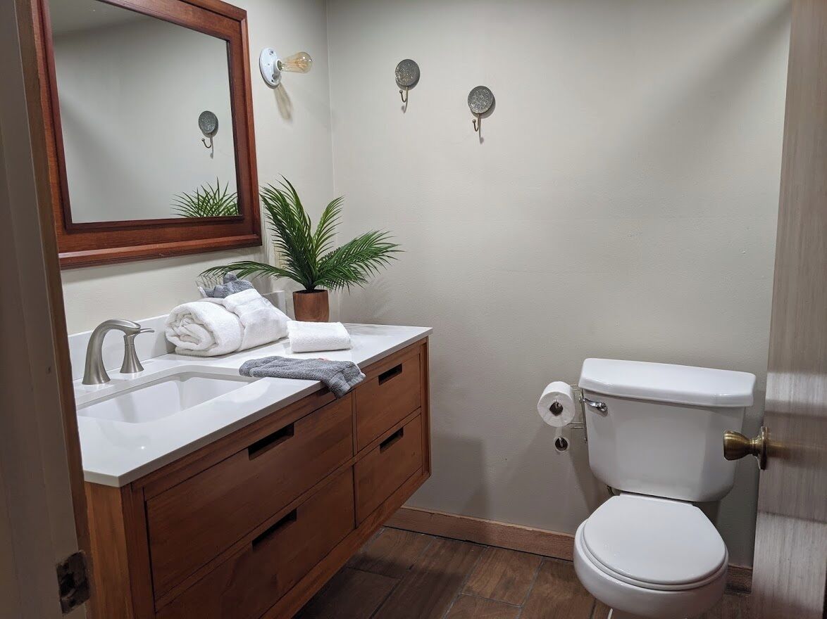 CampHouse + Hot Tub + Full Kitchen at Loblolly Pines | Bathroom | Hair dryer, towels, soap, shampoo